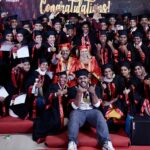 Proud Career Campus graduates holding certificates